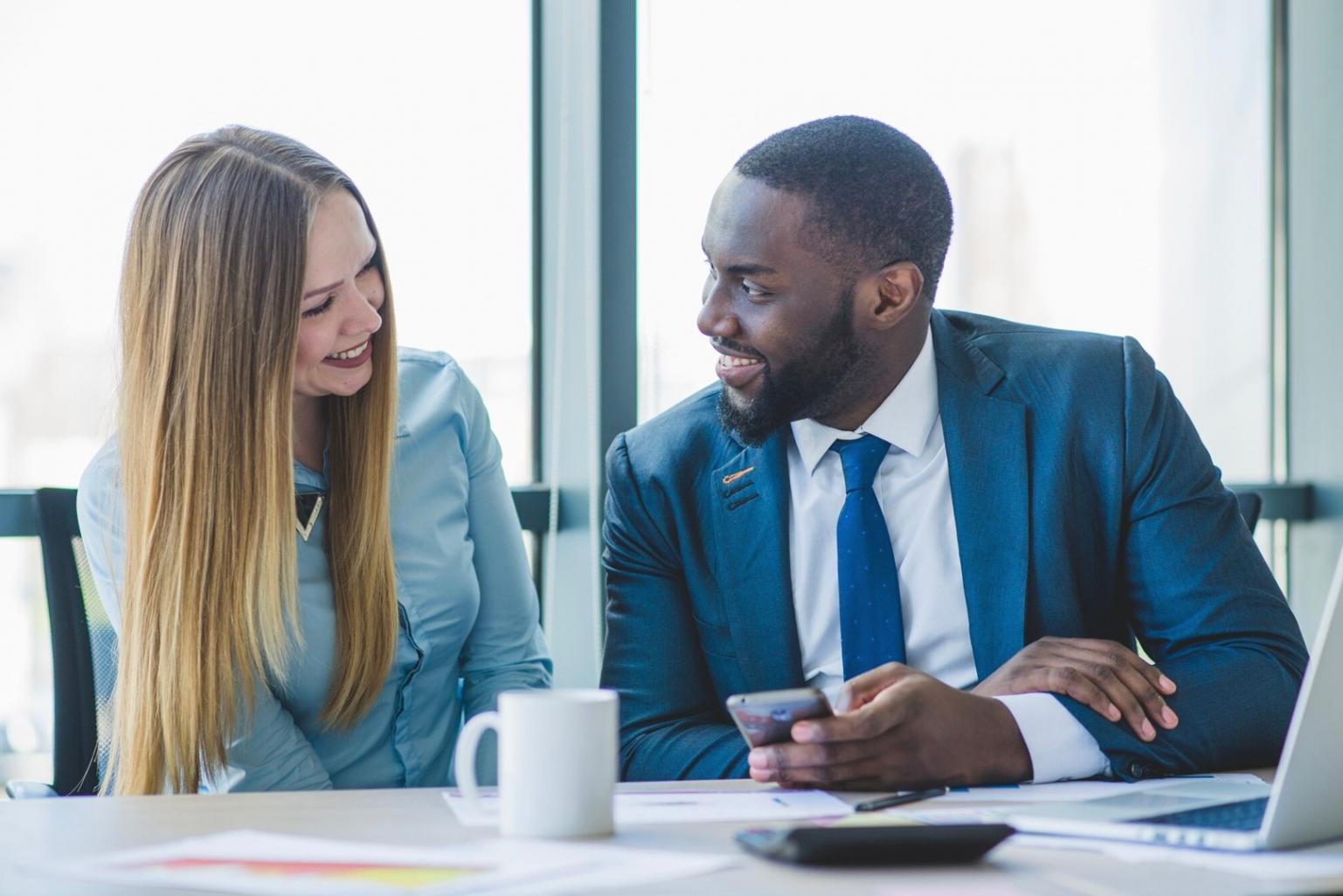 Business meeting discussing financial reports